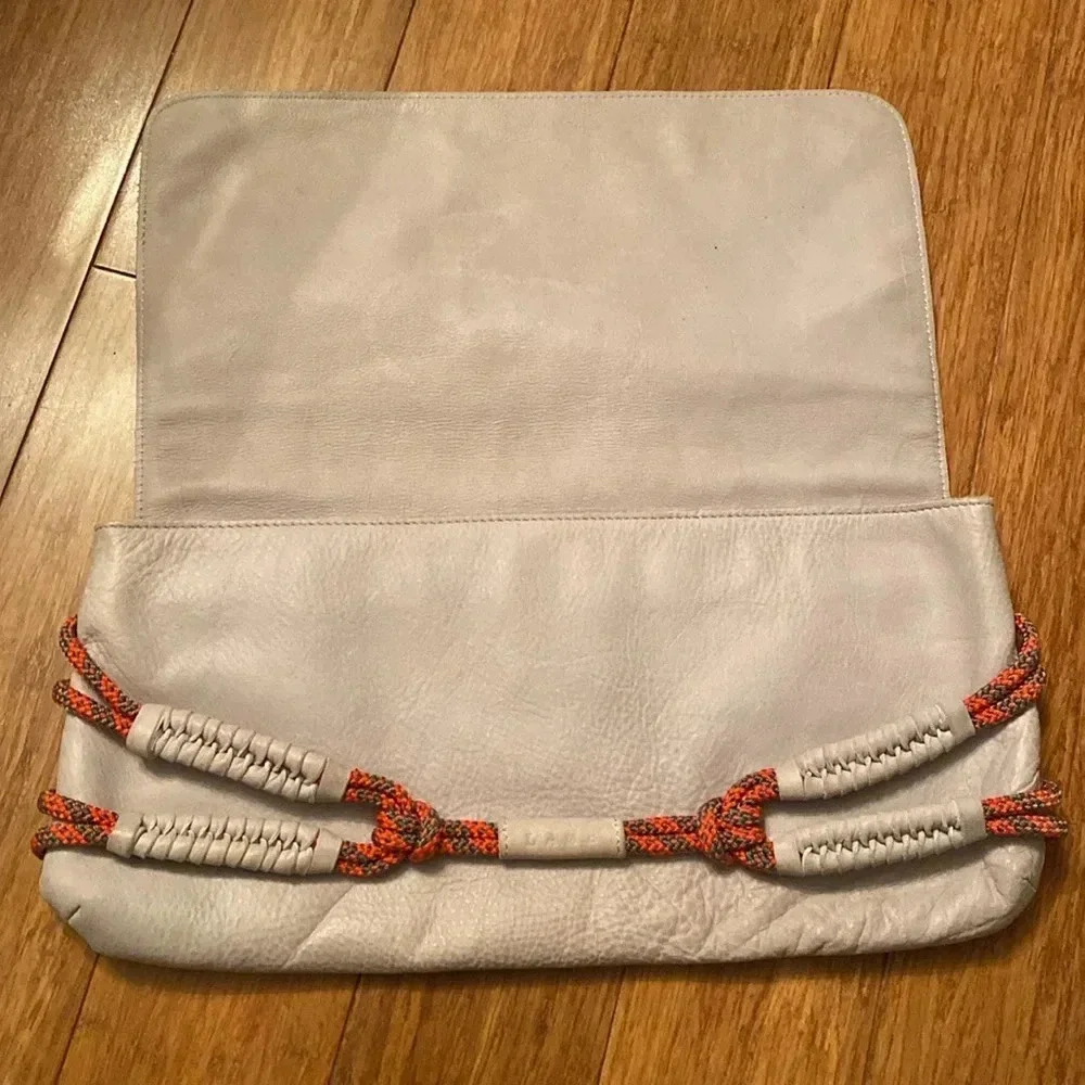 L.A.M.B. By Gwen Stefani gray Leahter clutch -orange rope detail